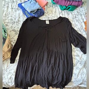 Black flowy shirt.